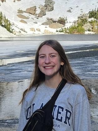 Photo of Ava Erickson, undergraduate research assistant, in the mountains